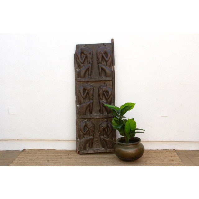 This is a genuine rarity, a Dogon door from Mali carved in identical deep relief on both faces, rather than the single...