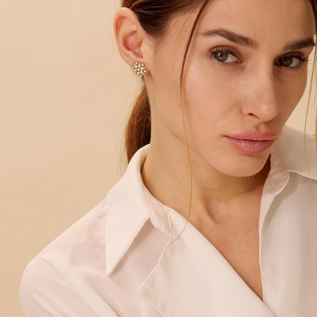 Created in 18 karat yellow gold Diamonds 0.80 carat approx. 18kyg butterfly backs Composed of 18 karat yellow gold, these...