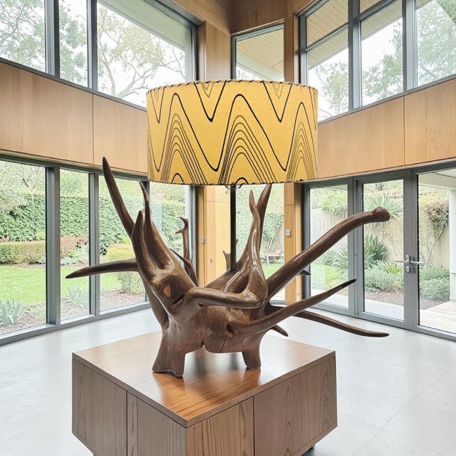 Monumental mid-century modern table lamp constructed from a dramatic natural teak root base measuring approximately 36...