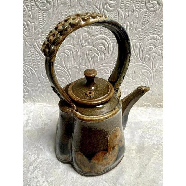 This vintage handcrafted teapot is a true studio art pottery piece by the talented potter Bob Nichols. With it’s unique...