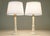 A brilliant and striking pair of slender Streamline Art Deco styled solid Milky white Alabaster Marble candlestick table...