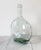 Vintage light green blown glass bottle with bubbles in glass. No makers mark. No chips.