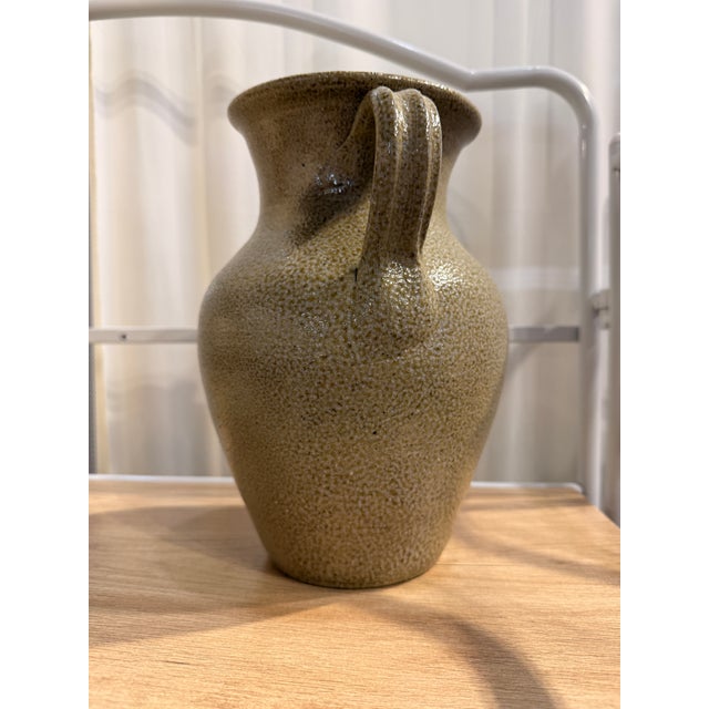 Hand-thrown studio pottery jug by C.P. Craven, produced in the renowned pottery community of Seagrove, North Carolina, one...