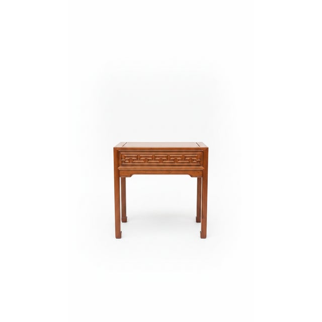 Vintage side table or small console produced in the late 20th century in a Chinoiserie style. The relatively tall...