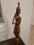 Overview A commanding, museum-grade Mid-Century Balinese modernist figurative sculpture standing at an imposing 21 inches....