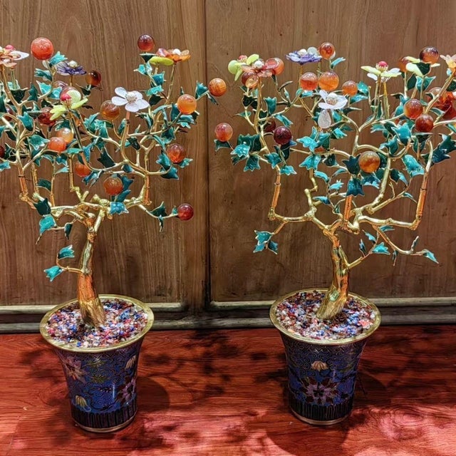This is a striking pair of vintage gemstone bonsai trees, each presented in a cloisonné enamel planter. The tree's trunk...