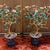 This is a striking pair of vintage gemstone bonsai trees, each presented in a cloisonné enamel planter. The tree's trunk...