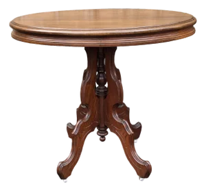 Late 19th Century Victorian Rococo Style Carved Walnut Oval Rolling Side Table