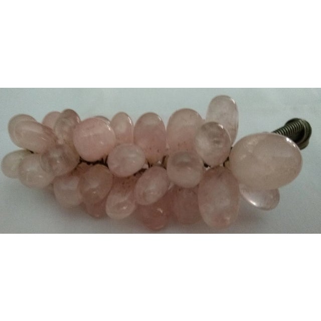 Collected in the 1960's while resident in Eritrea. Individual stone grapes secured to metal stem.