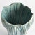 This artisanmade ceramic vase is a real beauty. The reactive glaze accentuates the natureinspired texture of the piece. A...