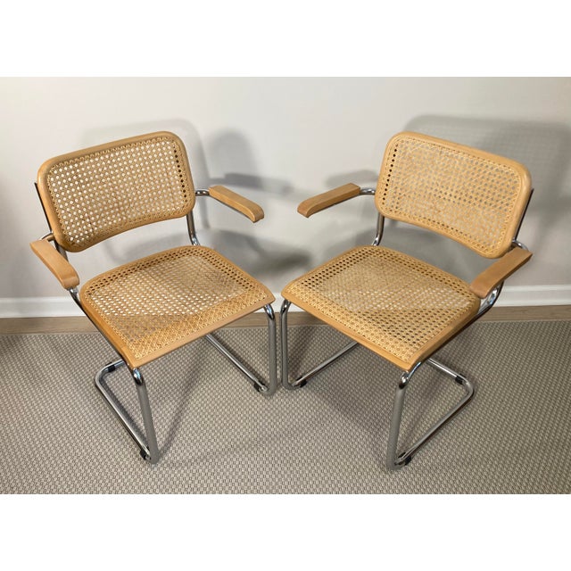 Produced by Gościcińskie Fabryki Mebli (GFM), this pair of chairs mimic the cantilever tubing and caning details of the...