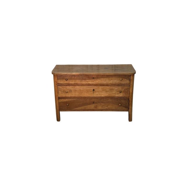 An elegant 19th-century period dresser in light walnut, featuring balanced lines and understated craftsmanship that...