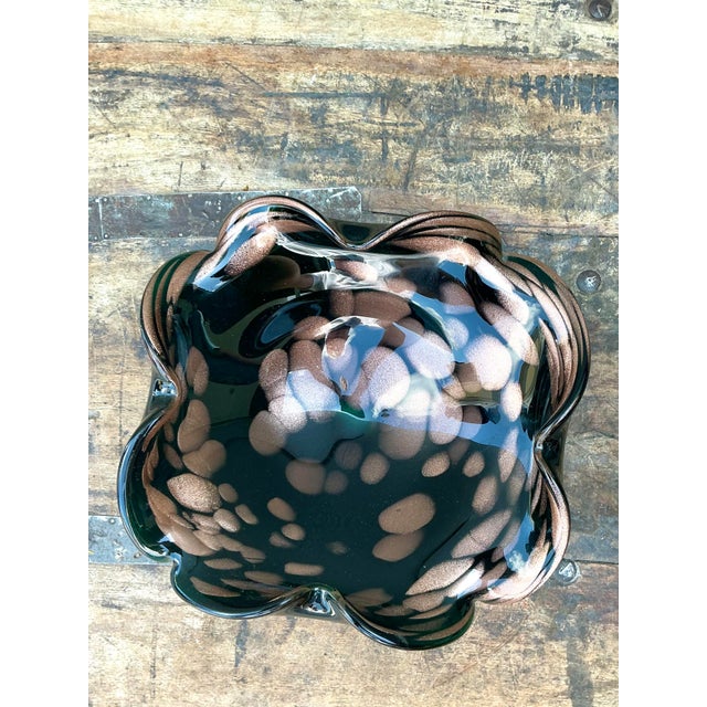 This exquisite vintage art glass bowl is a masterful example of mid-century Venetian craftsmanship, evocative of the...