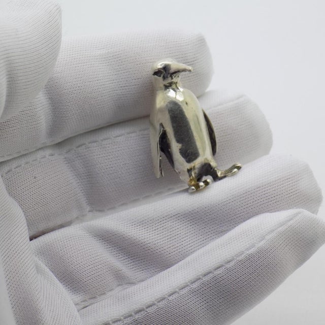 Charming vintage miniature depicting a penguin, handcrafted in Italy between the 1980s and 1990s in authentic Sterling...