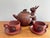 Delightful Chinese Yixing Zisha tea set in naturalistic design in the relief of a rabbit and gourd tea pot and lid of a...