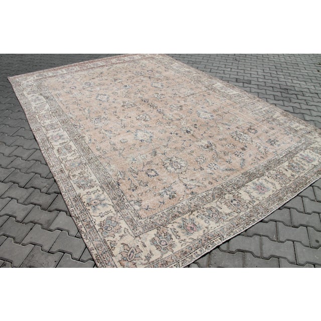 This gorgeous traditional hand knotted Vintage Anatolian rug is approximately 60 years old in excellent vintage condition....