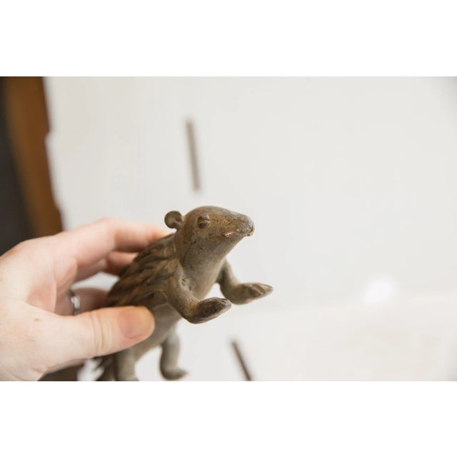 :: Vintage handmade African porcupine sculpture. Circa late mid 20th century, though possibly older, this piece has such...