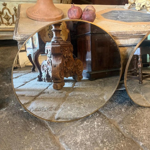 This elegant pair of 1990s round wall mirrors perfectly captures the timeless sophistication of the Italian Mid-Century...