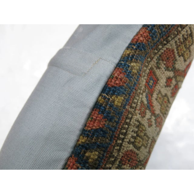 Pillow made from a 19th century persian bidjar rug with cotton back. Zipper closure and foam insert provided. 19'' x 20''