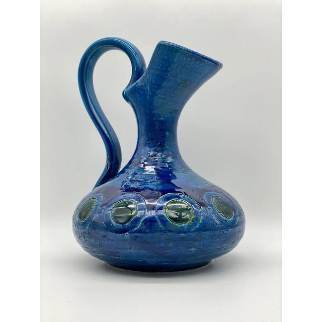 Ceramic glazed and decorated with green and blue circle designs inspired by the famous Rimini Blu series, Aldo Londi late...