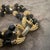 Gold 1980s Art Deco Style Black Cristal and Brass Multi Strand Bracelet by Trifari For Sale - Image 8 of 10