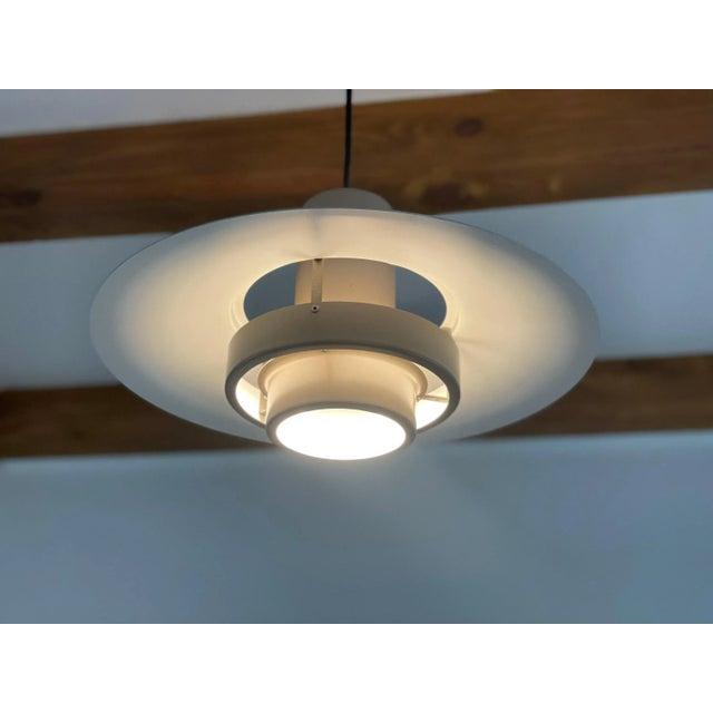 Original 60s from Denmark. Finally again clear Mid-Century design from Denmark for you. The pendant lamp makes an...