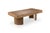 The centre table Malaparte, in solid wood, with his big wood top textured with the gougée technique, has his curved feet...