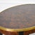Stunning pair of regency styled walnut burl and brass trimmed oval side tables by Henredon. Tapered legs with a supportive...