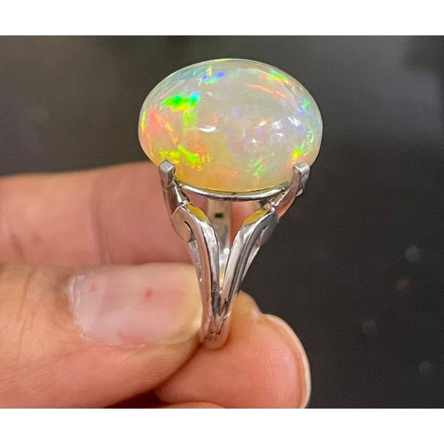14 Carat Oval Shape Ethiopian Opal Cocktail Ring in Platinum For Sale - Image 10 of 18