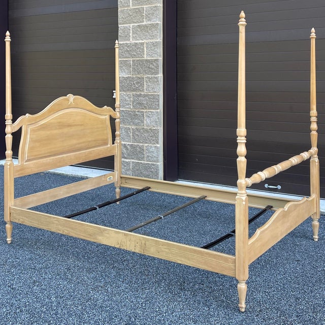 A late 20th century Ethan Allen Country French collection birch poster bed in their whitewashed Bisque finish. The bed is...