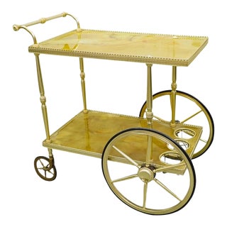 Vintage French Hollywood Regency Brass and Onyx Bar Cart With Bottle Holders on Wheels For Sale