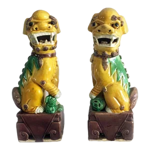 1920s Chinese Export Yellow Foo Dogs - a Pair