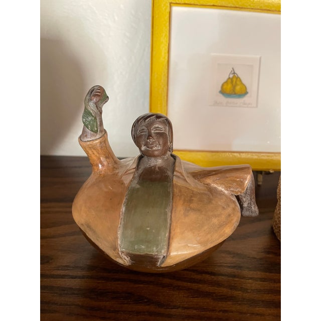 The base shown in the image is hand-signed by Peruvian master artisan Luis Sandoval from Chulucanas, Peru. I purchased...