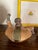 The base shown in the image is hand-signed by Peruvian master artisan Luis Sandoval from Chulucanas, Peru. I purchased...