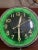 Seth Thomas Art Deco 16” Diameter "Chrono Lite-16" wall clock featuring a black dial with Original Green Gas Tube Neon...