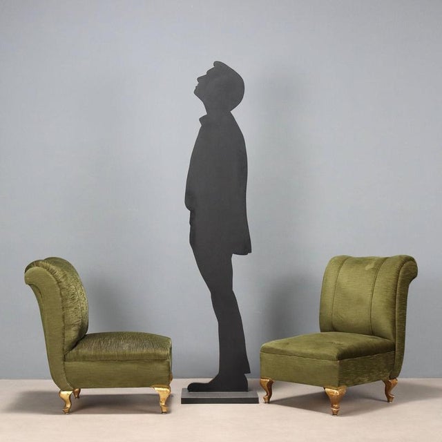 Pair of vintage armchairs with spring and feather padding, upholstered in original green fabric; gold-enameled wooden...