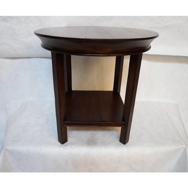 Traditional Round Wood Side Table With Lower Shelf Large enough for a lamp and some additional decor items, such as an...