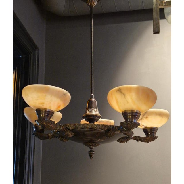 Early 1900s chandelier, bronze and alabaster with beautiful decor and details, Swedish Jugend. In good condition, we...