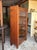 Charming and useful single door cabinet with 3 adjustable shelves, great for displaying pottery or books!