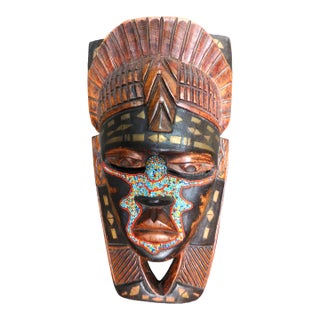 Vintage Hand Carved and Beveled Wooden African Wall Hanging Mask With Beaded Inlay. For Sale