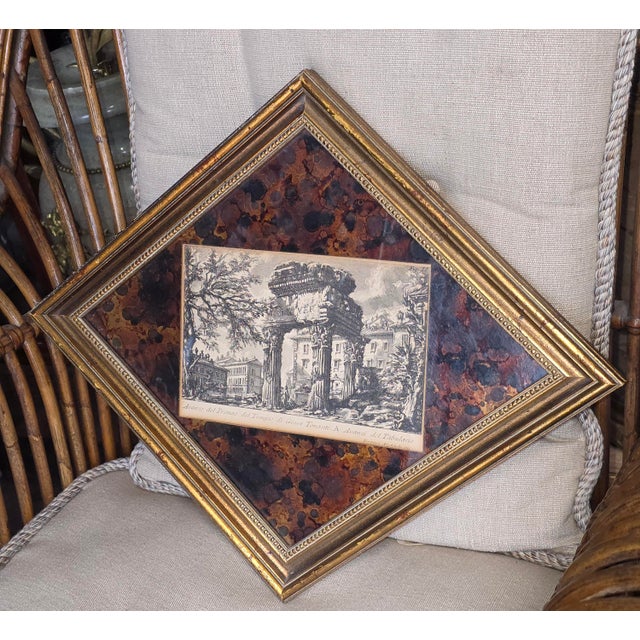 Great looking faux Tortoiseshell reverse painted glass and a vintage Piranesi print in an unusual shaped frame.
