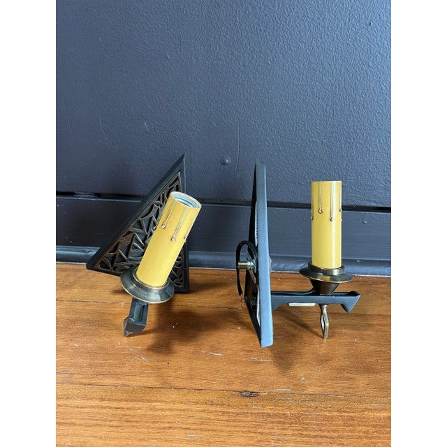 Pair of Art Deco triangle sconces with an antique steel finish. The sconces have been fully restored and rewired by...