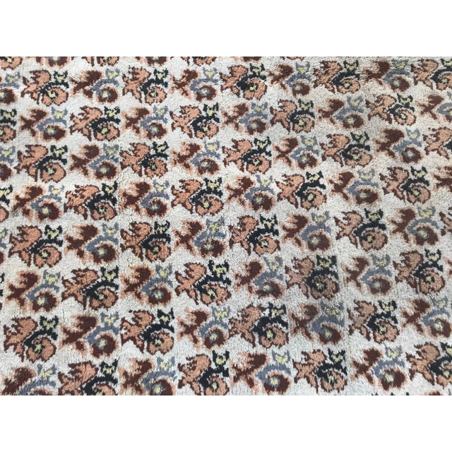 This large and beautiful Moroccan rug features light colors in full pile wool velvet on a cotton foundation.