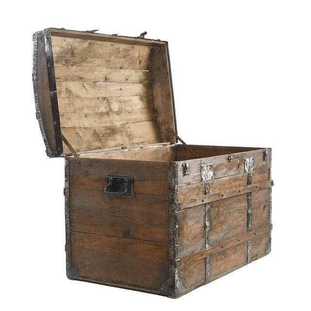 Wood and steel reinforcement chest or carriage trunk. This piece is designed in the style of the selected designer and/or...