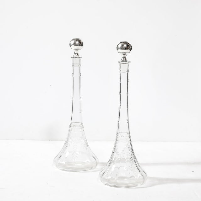 This exceptional pair of Art Nouveau cut crystal decanters, crafted in America circa 1910, blends artistry with function...
