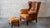 Art Deco 1970s Vintage Art Deco Distressed Cognac Leather Wingback Chair & Ottoman For Sale - Image 3 of 16