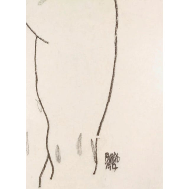 This lithograph from the portfolio "Egon Schiele" is a reproduction of "Weiblicher Rückenackt", an original artwork...