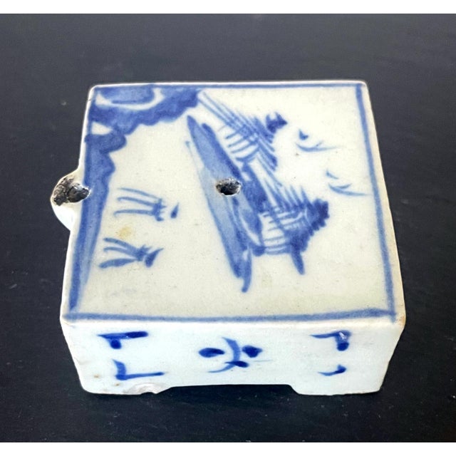 A small Korean ceramic water dropper in square form on four corner feet, circa 19th century late Joseon Dynasty. The piece...