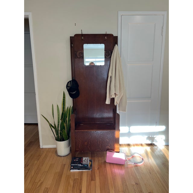 Elevate your entryway with this stunning, authentic Edwardian-era hall tree handcrafted by the renowned British furniture...