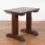 An Indonesian antique wine tasting table from the 19th century with trestle base. Created in Indonesia during the 19th...